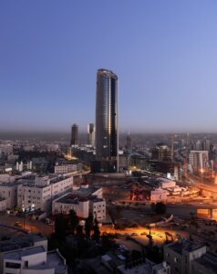 Amman Rotana Hotel tower lit at night